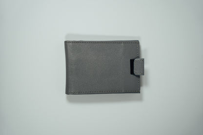 An exterior view of the the Gray Pull Tab Leather Wallet from John Candor at Hope's Gate 