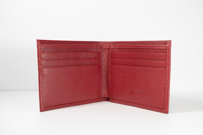 A red slim bifold leather wallet open to show multiple card slots and a full-length bill compartment.