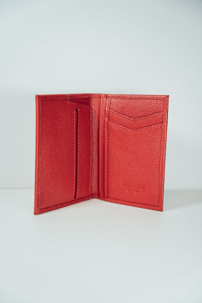 An interior view of the Red Slim Vertical Leather Wallet from John Candor